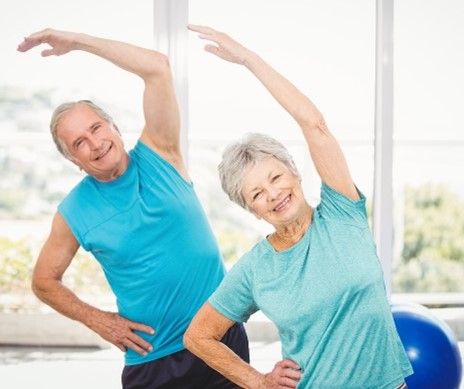 Man and woman stretching